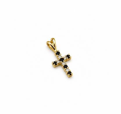 Small 9ct yellow gold sapphire and diamond cross pendant on white background