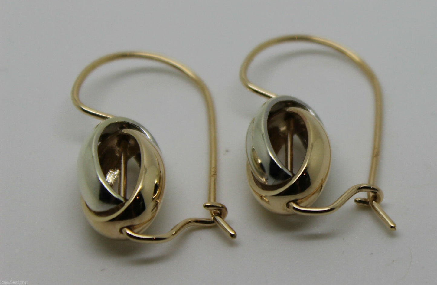 Genuine 9ct 9k 375 Yellow & White Gold Spinning Oval Belcher Earrings