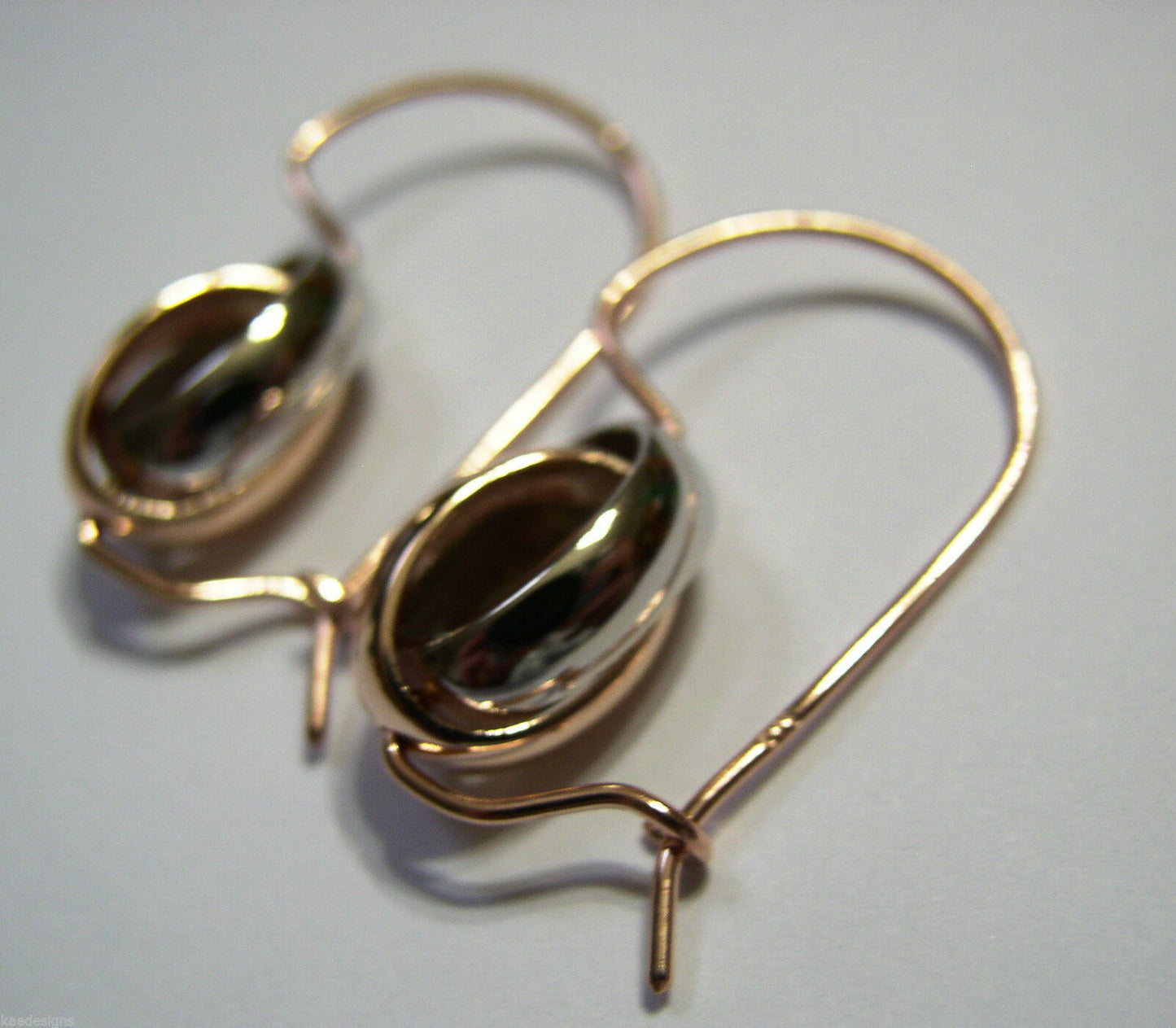 Genuine 9ct 9kt 375 Rose and White Gold Spinning Oval Belcher Earrings