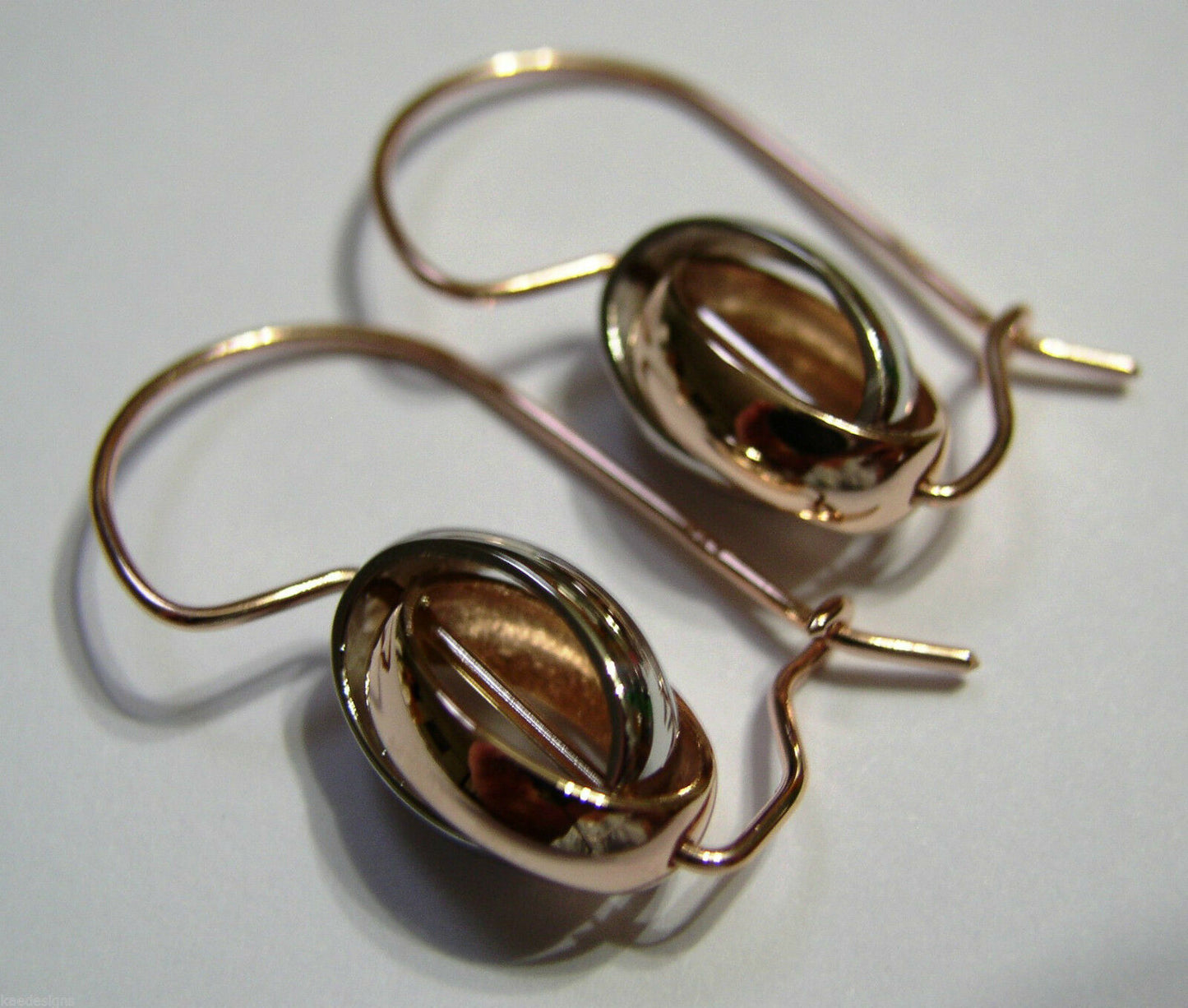 Genuine 9ct 9kt 375 Rose and White Gold Spinning Oval Belcher Earrings